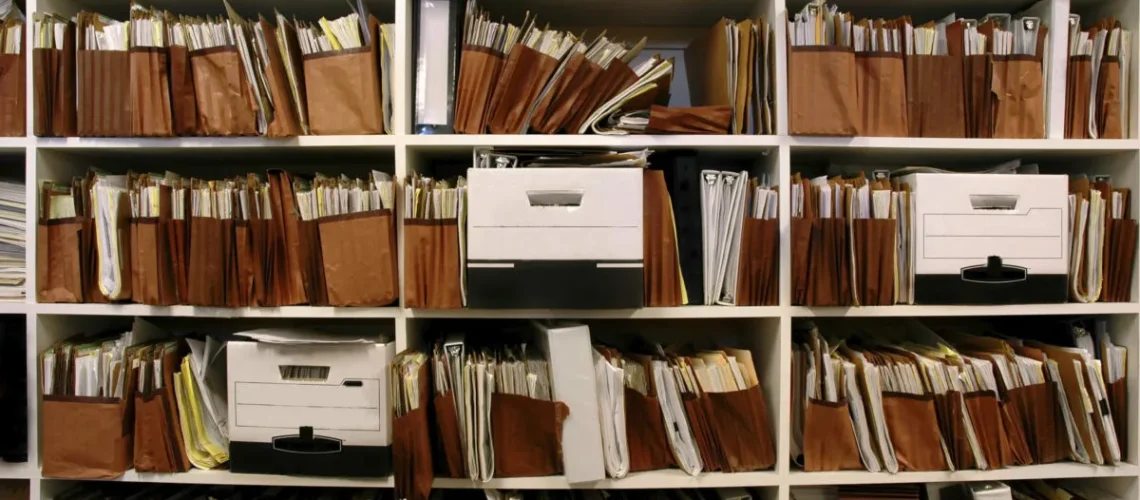 Office shelves full of files and boxes